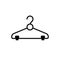 Clothes hanger glyph icon or clothing sign