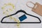 Clothes hanger and measuring tape with shopping bag and payment card