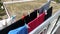 Clothes hanging by clothespin, drying clothes on the balcony