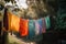 a clothesline with colorful, freshly laundered clothing