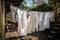 clothesline with freshly ironed shirts and towels, ready to be used