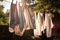 clothesline with freshly washed towels and linens drying in the sun