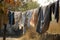 a clothesline sagging with the weight of freshly dried laundry