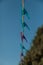 Clothespins on a clothesline against the sky, selective autofocus