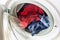 Clothing in washing machine. Concept- laundry, housework, house