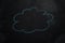 Cloud on black chalkboard