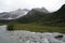 Cloud-capped mountains in the Daocheng Yading National Park, Sichuan, China.