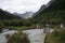 Cloud-capped mountains in the Daocheng Yading National Park, Sichuan, China.