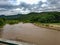 Cloud carpet sun shine middle comes through river cross bridge brown dirt water flow rain forest pai chiang mai thailand