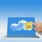 Cloud Computing words on sticky note with laptop computer