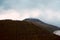 Cloud-Crowned Summit: The Silent Majesty of Alpine Peaks Amidst the Whispering Pines