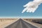 Cloud hand and empty desert road