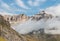 Cloud inversion at Sella Group mountain range in Dolomites