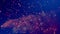 Cloud of multicolored particles fly in air slowly or float in liquid like sparkles on dark blue background. Beautiful