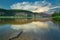 Cloud over the rocky bank of the taiga river River Amga.