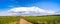 Cloud over rural landscape of Alberta farm fields