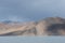 Cloud shadow on mountain range stand by lake