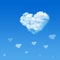 Cloud shaped heart in blue sky. Valentine`s Day concept