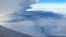 Cloud skyscape over plane window