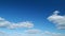 Cloud stratocumulus nature background. Blue sky with cumulus clouds and sun. Nature background of airy cloudscape