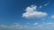 Cloud stratocumulus nature background. Blue sky with cumulus clouds and sun. Nature background of airy cloudscape