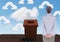 Cloud upload icons and Businesswoman standing on Roof with chimney and blue sky