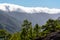 Cloud waterfall phenomenon at La Palma island, Spain near viewpoint Cumbrecita