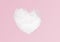 Cloud white shaped heart on pink background