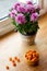 Cloudberry Rubus chamaemorus close up in orange bowl on wooden table,harvest in norwegian mountains near Hemsedal ski