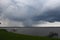 Cloudburst thunderstorm across the river