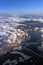 Clouds above the ground, the snow-covered fields