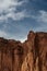 Clouds Begin To Gather Over Bright Orange Cliffs