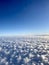 Clouds on a blue sky. Aero plane view