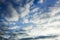 Clouds on blue sky. Cloudscape. Summer evening.