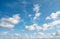 Clouds on a blue sky, natural cloudscape background