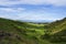 Clouds cast shadow down on Hollyrood park valley