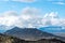 Clouds casting shadows over the mountains