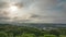 Clouds clear over rural mountains after sunrise