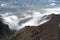 Clouds on a desolate landscape on Cayambe Volcano