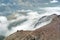 Clouds on a desolate landscape on Cayambe Volcano