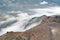 Clouds on a desolate landscape on Cayambe Volcano