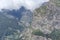 Clouds engulf summits of volcanic  steep slopes at Curral das Freiras valley, Madeira