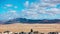 Clouds flying over the desert volcanic landscape of Fuerteventura. Costa Calma, Canary Islands