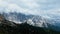 Clouds flying over mountains