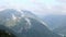 Clouds flying over mountains