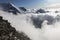 Clouds and fog over the Chamonix valley. View from the Cosmique refuge, Chamonix, France. Perfect moment in alpine highlands