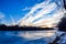 Clouds and the Frozen Des Moines River in Iowa