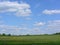 Clouds go over the field