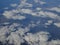 clouds, land, and ocean of Japan, aerial view