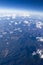 Clouds and mountains chain airplane view